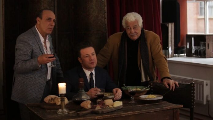 Jamie Oliver, Gennaro Contaldo, and Antonio Carluccio sharing a meal together