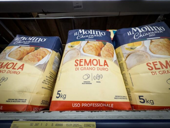 Bags of Semola di Grano Duro durum wheat semolina displayed on a store shelf for pasta and bread making